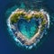 Landscape symbol of romance and love with a heart shaped forest with roks and sea surf seen from the sky