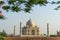 Landscape of the Taj Mahal from north side across the Yamuna river at sunset