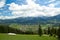 Landscape of the Tatra Mountains in the summer, cloudy blue sky.