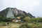 Landscape of Tiantan temple and big chedi pagoda in Tian Tan Garden with mountain at Shantou or Swatow in Chaozhou, China