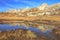 Landscape of Torre dei Scarperi mountain by reflecting water of the Tre Cime in Italian Dolomites