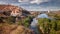 Landscape the town of Asco with its nuclear power plant in the background and the Ebro river that cools it, Tarragona, Spain