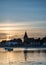 Landscape tranquil harbour at sunset with yachts in low tide