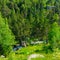 Landscape with trees, grasses and creek