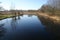 Landscape and trees mirroring in the surface water