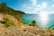 Landscape with trees on rock turquoise sea Baikal