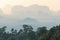 Landscape of tropical hazy mountains perspective and the green jungle trees