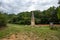 Landscape of Tuscany with monument along via Francigena, Italy