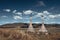 Landscape with two lonely Buddhist stupas in the background of h