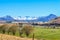 Landscape of Underberg , a small countryside village with snow clad drakensberg mountains and green landscapes