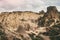 Landscape of valley and a tourist silhouette in Cappadocia