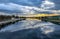 Landscape of Velikaya River at sunset with the Spaso-Preobrazhensky Mirozhsky Monastery of the Pskov in background