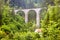 Landscape with viaduct in Filisur, Switzerland. Scenic view of high bridge in Alpine mountains