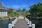 Landscape View of Beautiful upscale resort hotel with small wooden bridge connecting the walkway with the villas