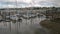 A landscape view of boats on the water in downtown olympia washington.