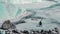 Landscape view of climber walking on ice near the Everest Base Camp.