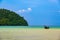 Landscape view of coastline with limestone rock and boats on ocean at Ko Phi Phi islands, Thailand. Concept of exotic tropical