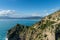 landscape view of the Costa di Maratea with a narrow and winding coastal highway in the cliffside