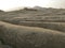 Landscape view with crevasses near muddy volcanoes