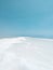 Landscape view on Dead Sea salt crystals formations, clear cyan green water at Ein Bokek beach, Israel