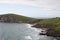 Landscape view of Dunmore Head in Dingle, Ireland, with blue sky in the background