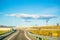 Landscape view on Expressway with mountains and blue sky back