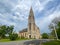 Landscape view of the First Presbyterian Church. Erected in 1871, it features a three-panel