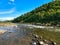 Landscape view of a hilly river and woods, Choral River