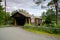 A landscape view of the historic Livingston Manor Covered Bridge seen at the