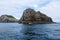 Landscape view with of a hole in the rock, Piercy Island, New Zealand