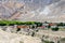 Landscape view of Kingdom of Lo Manthang with Green Tibetan Desert Background in Mustang of Nepal