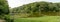 Landscape view of the lake in the Belgrad Forest, Istanbul with lush trees reflected on water