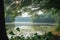 landscape view of a lake with trees and fog in the morning