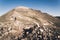 Landscape view of a man walking towards the top of Quandary Peak.