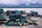 Landscape view of many fishermen traps stacked in rows on the sh