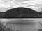 A landscape view of a mountain behind the frozen Sterling Lake.