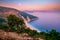 Landscape view of Myrtos beach at colorful sunrise, Kefalonia, Greece