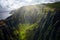 Landscape view of Na Pali coastline cliffs with sunlight glow, Kauai, Hawaii