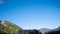 landscape view of nature forest with mountain range hills trees and clear blue sky background in fall autumn season of kamikochi,