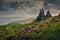 Landscape view of Old Man of Storr rock formation, dramatic clouds, Scotland