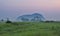 Landscape view of paddy fields,village,coconut tree,mountain during sunrise