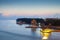 Landscape view of pagoda on sunrise reflection on sea