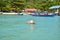 Landscape view of passengers boat and fishing boat at the beach