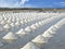 Landscape view of pile of salt in the salt pan.