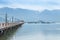 Landscape view of public lighthouse on pier of Salak Phet fishing village Salak Phet bay at Koh Chang Island , Trat Thailand