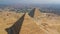 Landscape view of Pyramid of Khafre and Pyramid of Khufu, Giza pyramids landscape. historical egypt pyramids shot by drone.