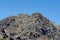 Landscape view of the rocky Paradise Craggy cliff under blue sky in Siskiyou County, California