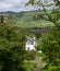 Landscape view of the rolling hills near Aberfeldy, in Highlands, Scotland UK. White painted Bolfracks House in foreground.