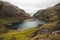 Landscape view of Saksun village waterfall and lake