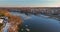 Landscape view on the shore of the river floating ice drifting floes on view of the residential districts individual